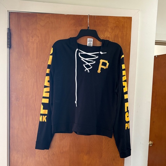 Victoria's Secret Tops - Pittsburgh pirates 
Victoria's Secret Black Pullover Hoodie with Yellow Logo